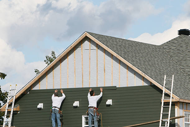 Professional Vinyl Siding technician working in Strongstown, PA